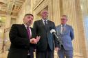 Health Minister Robin Swann (left), UUP leader Doug Beattie (centre) and UUP MLA Mike Nesbitt speaking after the Stormont Executive agreed a budget not supported by the party (David Young/PA)