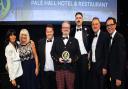 The team from Palé Hall receives its award at the AA Hospitality Awards 2023.