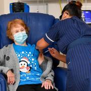 Margaret Keenan, 90, is the first patient in the United Kingdom to receive the Pfizer/BioNtech covid-19 vaccine at University Hospital, Coventry, administered by nurse May Parsons, at the start of the largest ever immunisation programme in the UK's