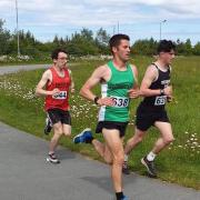 Shaun Hughes running strongly during the Welsh Athletics 5K at Marsh Tracks, Rhyl.