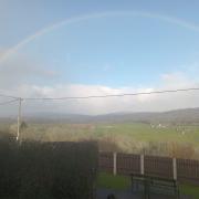 A rainbow over Rhug Farm by Lynnette Andrews