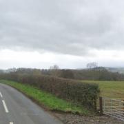 Ms Fiona Jones was granted planning permission by Denbighshire for an agricultural building at her home at Cwm Hyfryd, Llandyrnog. A view of the land from the road.