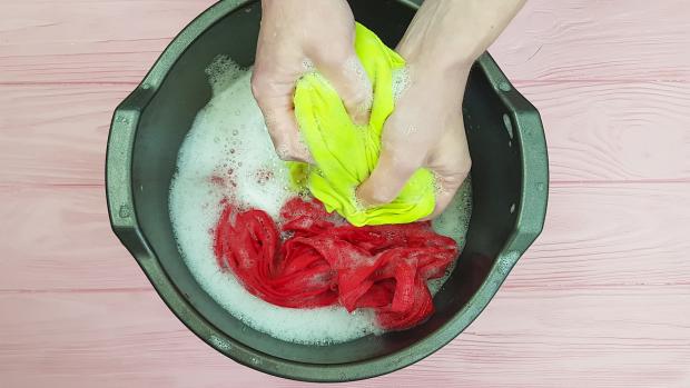 Denbighshire Free Press: Hand wash delicate clothing using a mild laundry detergent instead of the stuff you usually pour in your washing machine. Treat them gently, or you might wish you'd taken your clothes to the cleaners. Credit: Getty Images / Tanya Lovus