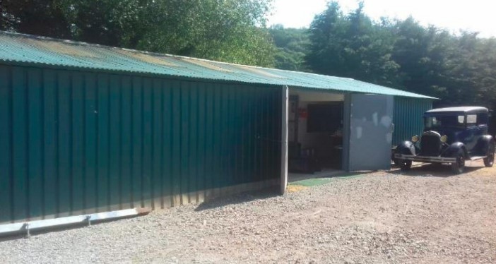 The former nursery packing shed with one of Mr Dyche\s vintage Ford cars Picture: In planning documents (clear for use by all partners)