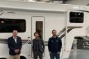 Sam Rowlands, North Wales MS was impressed with the Fifth Wheel RVs and is pictured with pictured with Dave Robinson (Fifth Wheel) and Mike Learmond (Federation of Small Businesses).