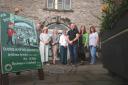 Denbigh Open Doors committee 2022 outside Denbigh Library which celebrates its 450th birthday