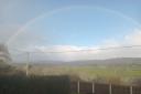 A rainbow over Rhug Farm by Lynnette Andrews