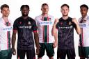 Wrexham players model the club's new away and third kits.