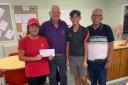 Rhuddlan Bowling Club's Annual Open Mixed Triples Competition winners Louise Dougal, Jack Dougal and Shaun Williams.