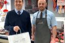 Vale of Clwyd MP Dr James Davies pictured with 2023 winner Daniel Morris Butchers of Denbigh who scooped the Champion Butcher prize at the regional awards.