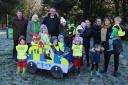 North Wales Police and Crime Commissioner Andy Dunbobbin met members of Efenechtyd Community Council, including Chair Wynn Jones, and children from the Miri Meithrin nursery.