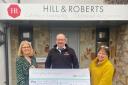 Hill & Roberts present a £728 cheque to Gofal Dydd y Waen