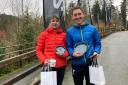 Emma Collins and Tony Wood with their trophys, Winter Trail Gaeaf 2024
