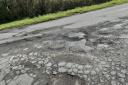 Potholes in the road in Trefnant