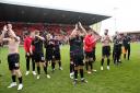 Wrexham players applaud their fans at Crewe. Picture: PA