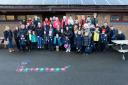 Parents campaign to keep Lixwm School open. Pic: Parents and pupils at Lixwm School. GA150118F.