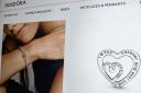 Picture shows the Entwined Infinite Hearts Charm via the Pandora website.