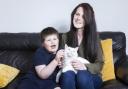 Connor Raven, pictured with mum Siobhan and award winning cat Minty.