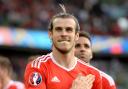 File photo dated 25-06-2016 of Wales' Gareth Bale celebrates victory. Wales captain Gareth Bale has announced his retirement from club and international football. Issue date: Monday January 9, 2023.
