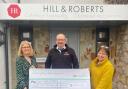 Hill & Roberts present a £728 cheque to Gofal Dydd y Waen