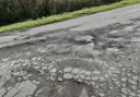 Potholes in the road in Trefnant