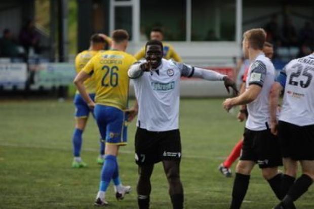 Lassana Mendes celebrates one of his two goals. Picture: Bala Town FC