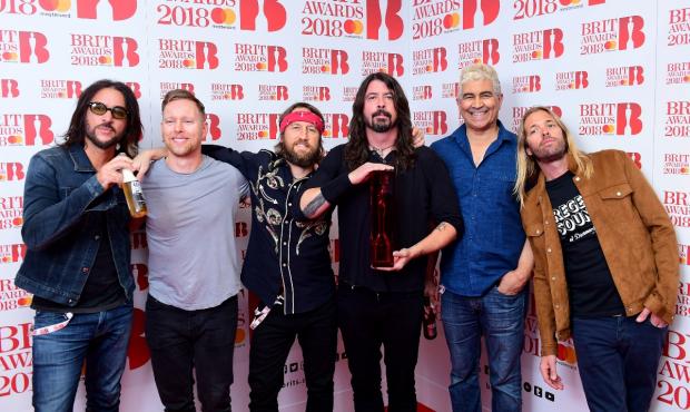 Denbighshire Free Press: Foo Fighters with their award for Best International Group during the 2018 Brit Awards (PA)