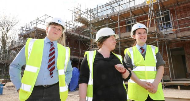 Denbighshire Free Press: Caroline Thomas of Brenig Construction with students Holly Nicholson and Luke Main. Picture: Rick Matthews
