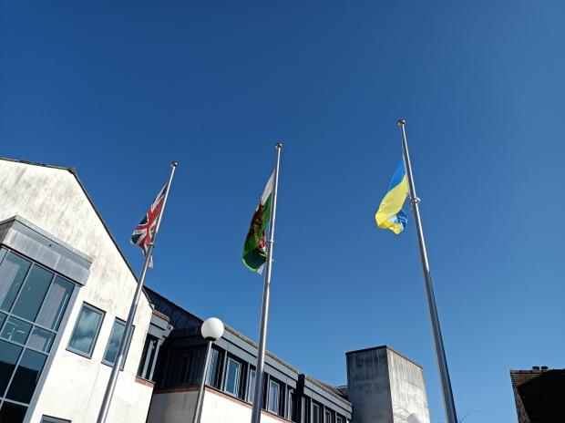 Denbighshire Free Press: The Ukrainian flag flies outside Denbighshire County Council's Ruthin HQ