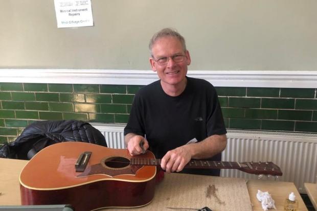 Pete Regan, the guitar 'fixpert' at Ruthin Repair Café