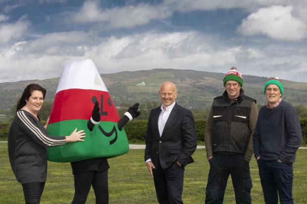 Mario Kreft (Centre) with from left, Sian Eirian with Mr Urdd  and Bryan Jones Cledwyn Jones who masterminded the project.