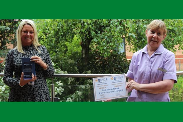 Ysgol Bryn Gwalia headteacher Lorraine Dalton and Diane Sweeney, activities co-ordinator and Patient Experience Champion at Mold Community Hospital.