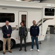 Sam Rowlands, North Wales MS was impressed with the Fifth Wheel RVs and is pictured with pictured with Dave Robinson (Fifth Wheel) and Mike Learmond (Federation of Small Businesses).