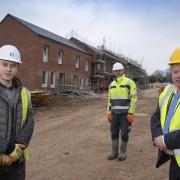 Brenig construction; Llwyn Eirin work experience;   Pictured is work experience recruit Kieran Rowlands pictured with site Manager John Breslin and Cllr Tony Thomas.            Picture Mandy Jones
