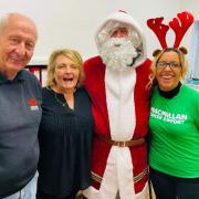 Ali Alcock (furthest right) with Geoff and Andrea Ellison of Dragon Drilling and Santa Claus for the live draw for the latest cash prize.