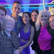 Amber Davies has had a lot of support! Pictured with her nan Jeanette (front left), her mum Susan (pink top), her boyfriend Ben Joyce (back left) and Simon Proulx-Sénécal, stood with Amber.