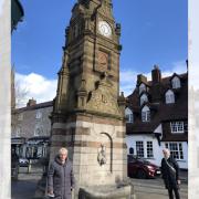 Fiona Gale, chair of the Ruthin Town Clock Restoration Committee, and cllr Anne Roberts, mayor and member of the Ruthin Town Clock Restoration Committee, with the clock